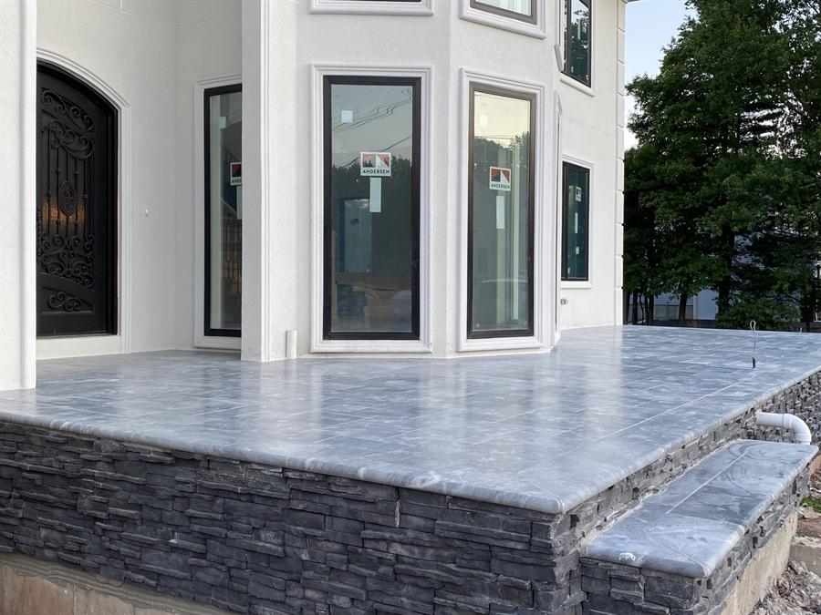 Tiled entry and exterior steps by Silcam Tile on a large residential project in New Jersey